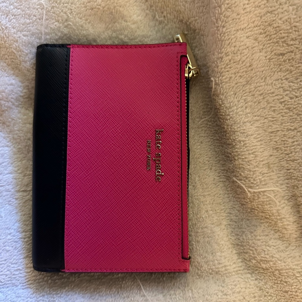 Kate Spade passport wallet. Brand new with tags